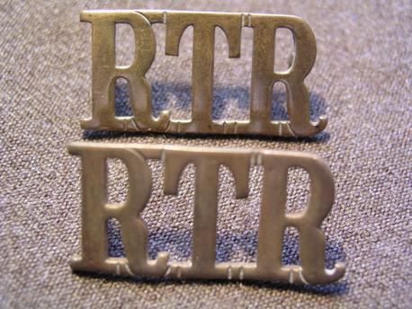 A pair of Royal Tank Regiment Brass Shoulder Titles